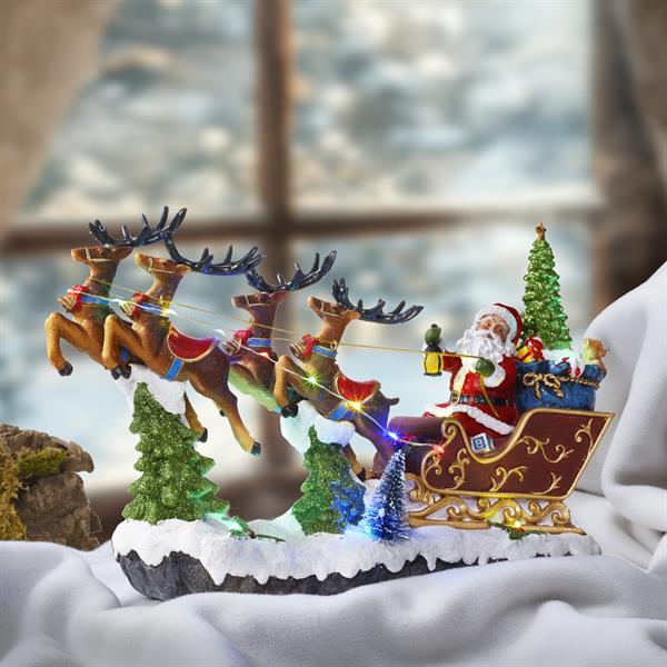 SLITTA BABBO NATALE CON LUCI LED MUSICA E MOVIMENTO CM.34X10XH22